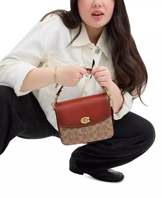 Signature Canvas Mini Cassie Crossbody 19