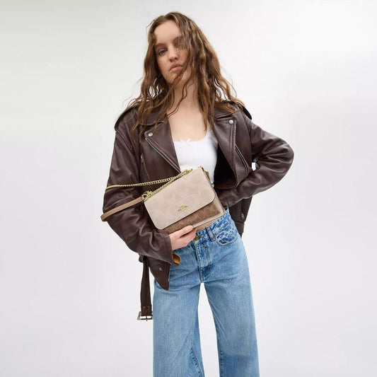 Klare Crossbody Bag In Blocked Signature Canvas