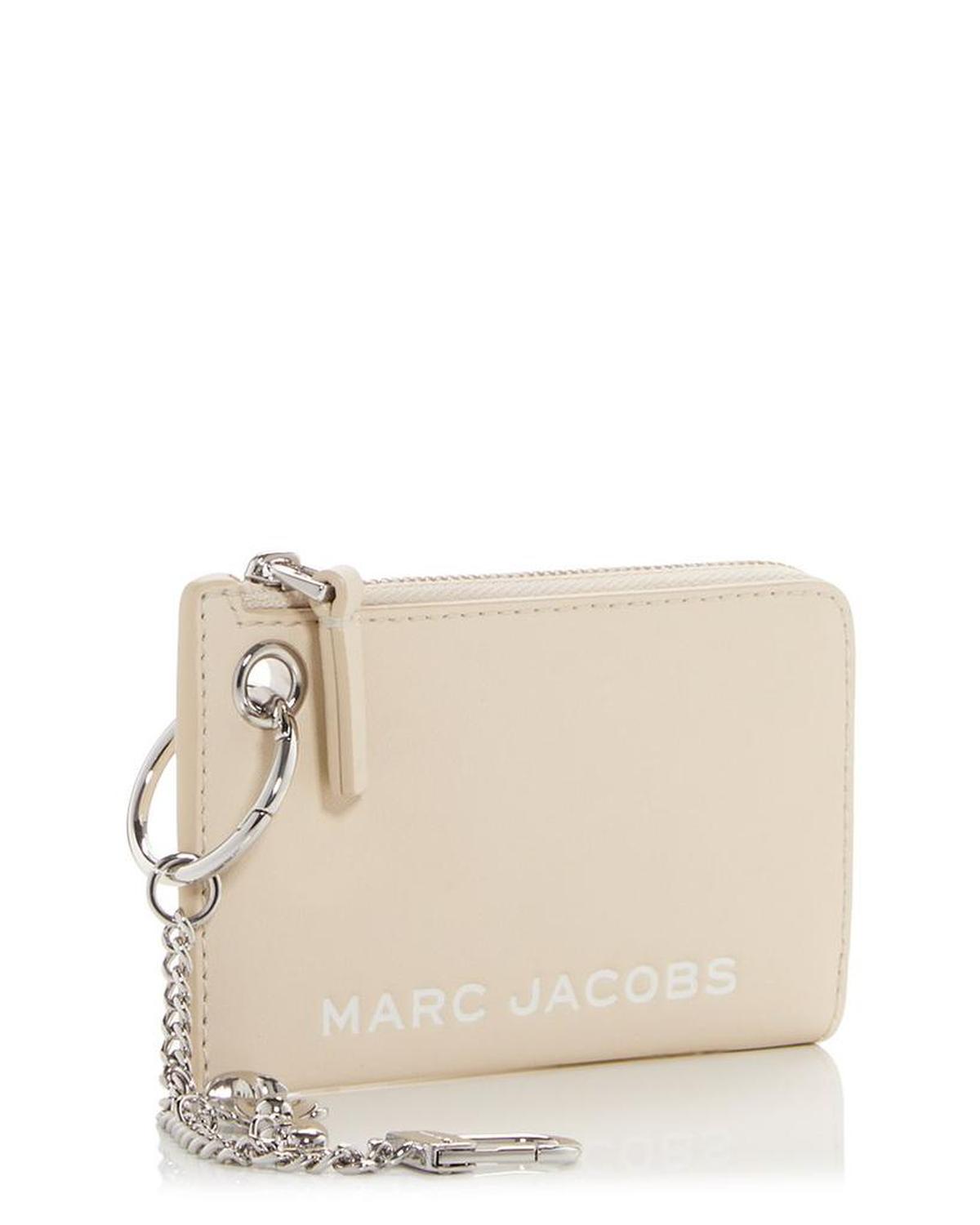 The Coin Charm Leather Case