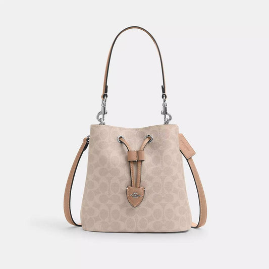 Rowan Bucket Bag In Signature Canvas