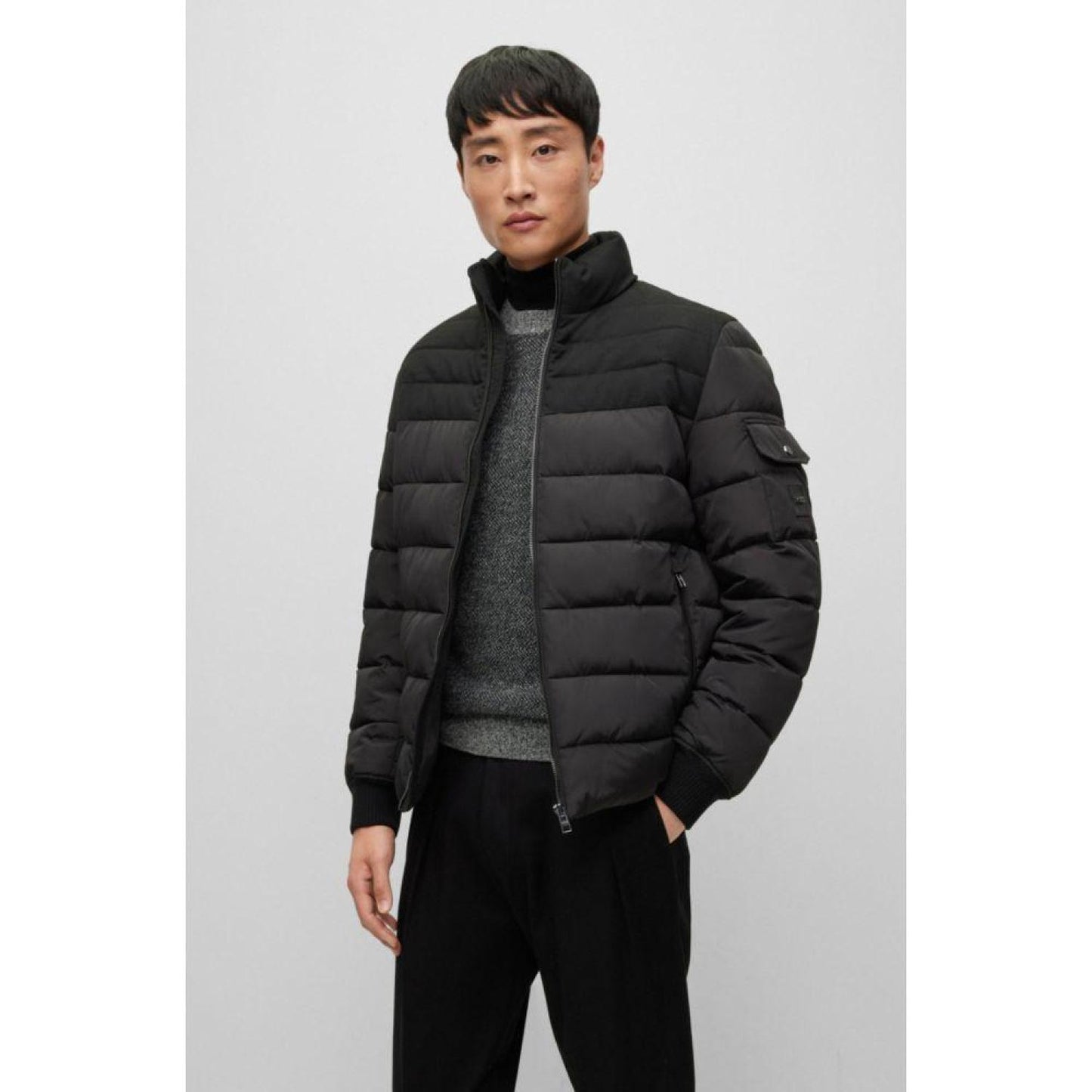 Water-repellent padded jacket with zip closure