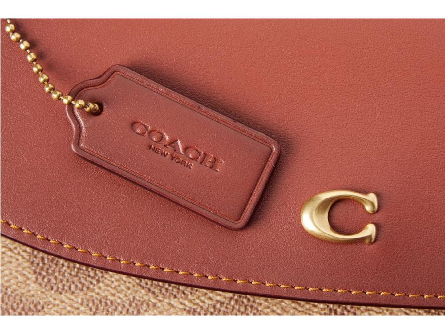 Coated Canvas Signature Hayden Crossbody