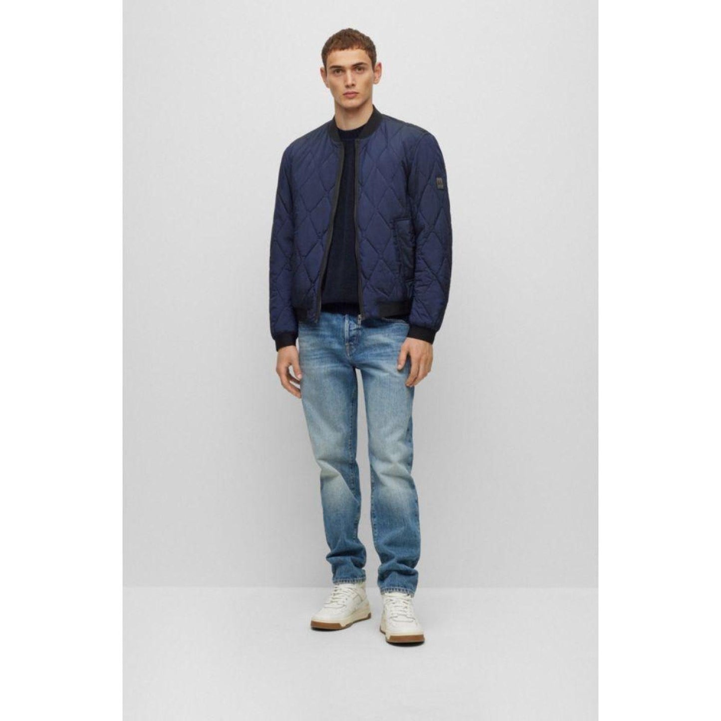 Logo-badge bomber jacket in quilted metallic-effect material