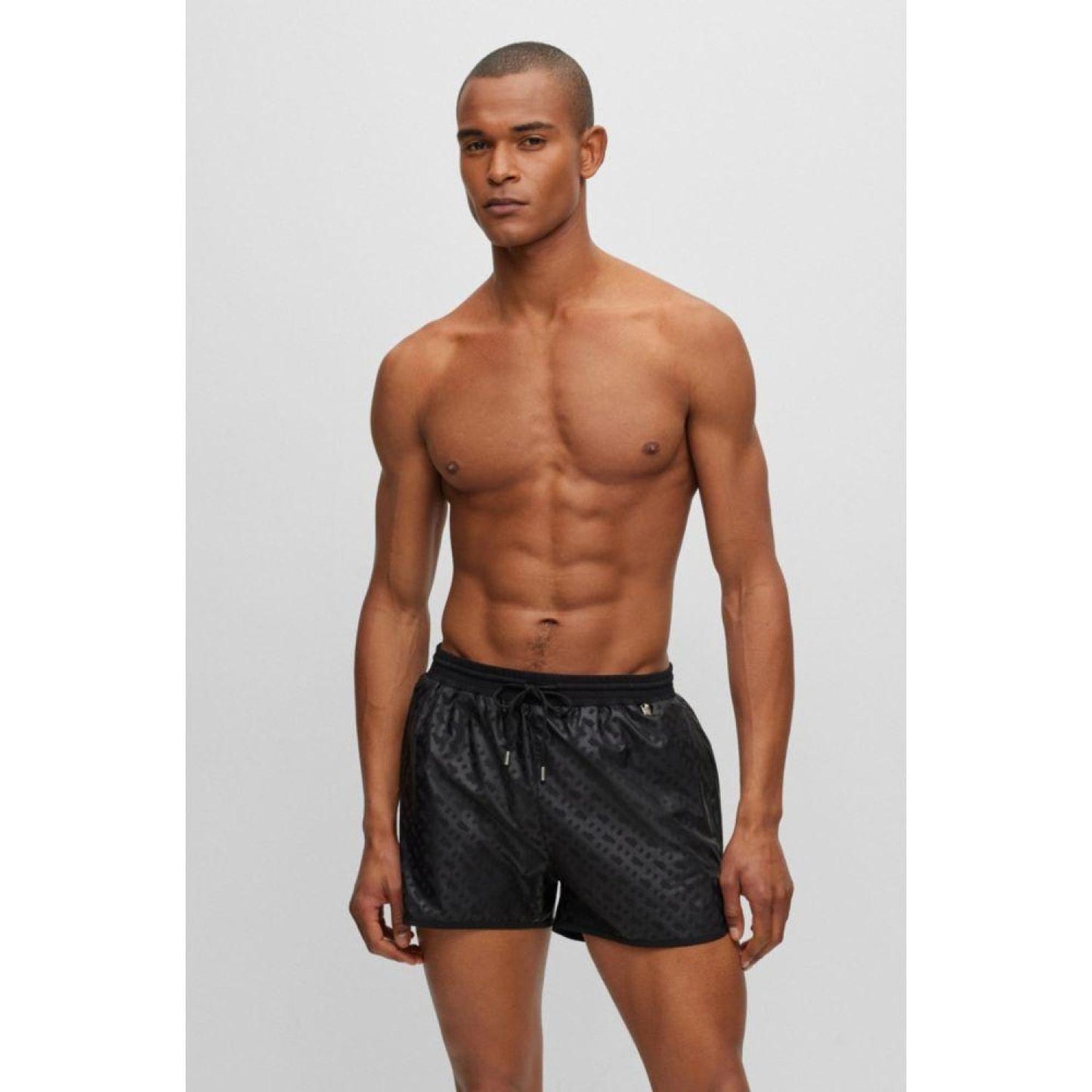 Monogram-print swim shorts in quick-drying fabric