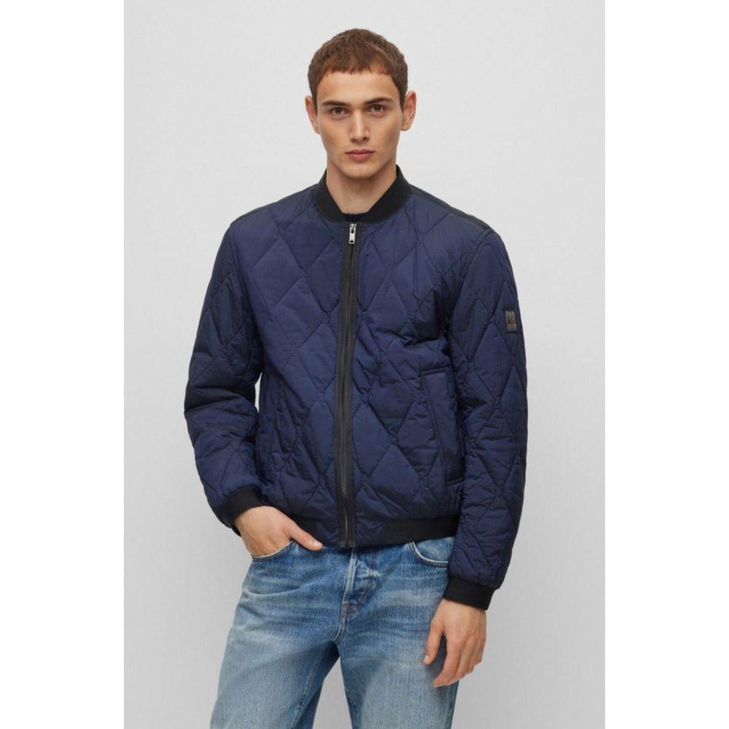 Logo-badge bomber jacket in quilted metallic-effect material