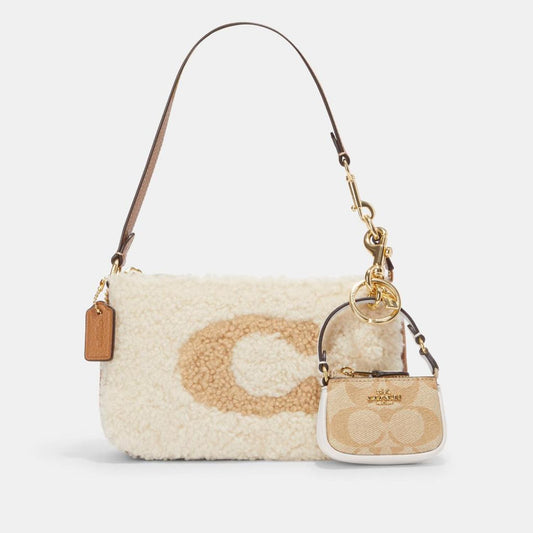 Coach Outlet Mini Nolita Bag Charm In Signature Canvas