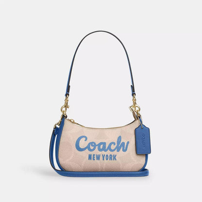 Teri Mini Crossbody Bag In Signature Canvas With Coach Graphic
