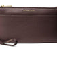 Jet Set Medium Top Zip Convertible Wristlet