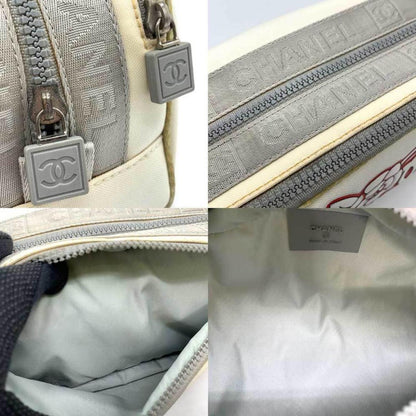 Chanel Camellia  Canvas Clutch Bag (Pre-Owned)