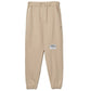 Comme Des Fuckdown Chic Beige Cotton Sweatpants with Frayed Details