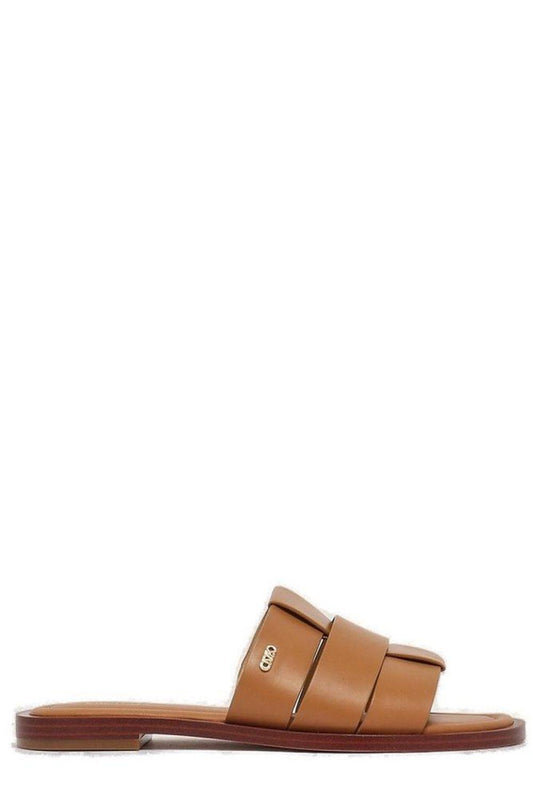 Michael Kors Logo Plaque Slip-On Sandals