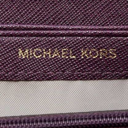 Michael Kors Plum Leather Mercer Zip Around Wallet..