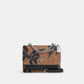 Klare Crossbody Bag In Signature Canvas With Bow Print
