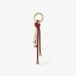 Gold-Tone and Speckled Cord Bag Charm