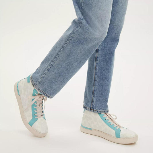 Coach Outlet Clip High Top Sneaker In Signature Canvas