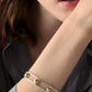 Two-Tone Sculpted Spade Cut Out Bangle Bracelet