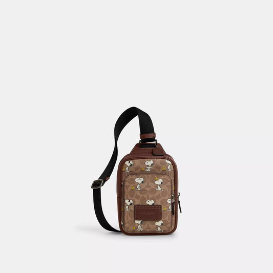 Coach X Peanuts Racer Sling Pack In Signature Canvas With Snoopy Print