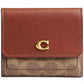 Mila Small Flap Wallet in Signature Canvas