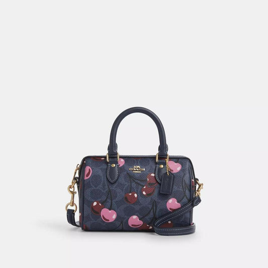 Mini Rowan Crossbody Bag In Signature Canvas With Cherry Print