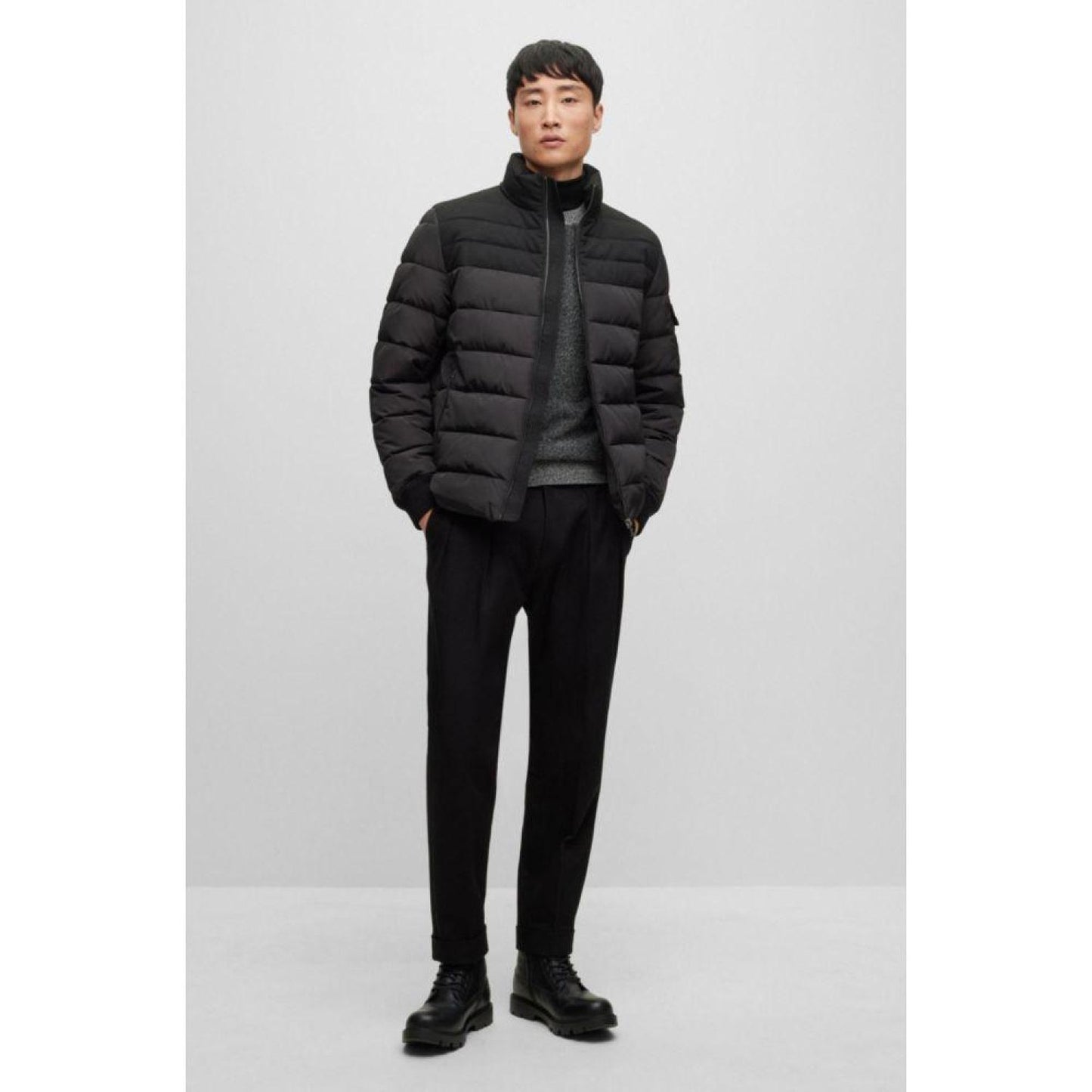 Water-repellent padded jacket with zip closure