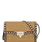 Valentino garavani raffia rockstud small crossbody bag