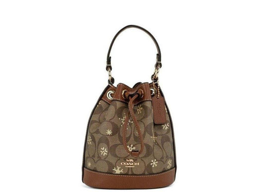 COACH Dempsey 15 Small Snowflake Print  Coated Canvas Bucket Women's Bag