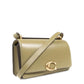 Coach Bandit Logo Plaque Crossbody Bag