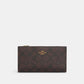 Coach Outlet Slim Zip Wallet In Signature Canvas