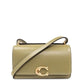 Coach Bandit Logo Plaque Crossbody Bag