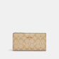Coach Outlet Slim Zip Wallet In Signature Canvas