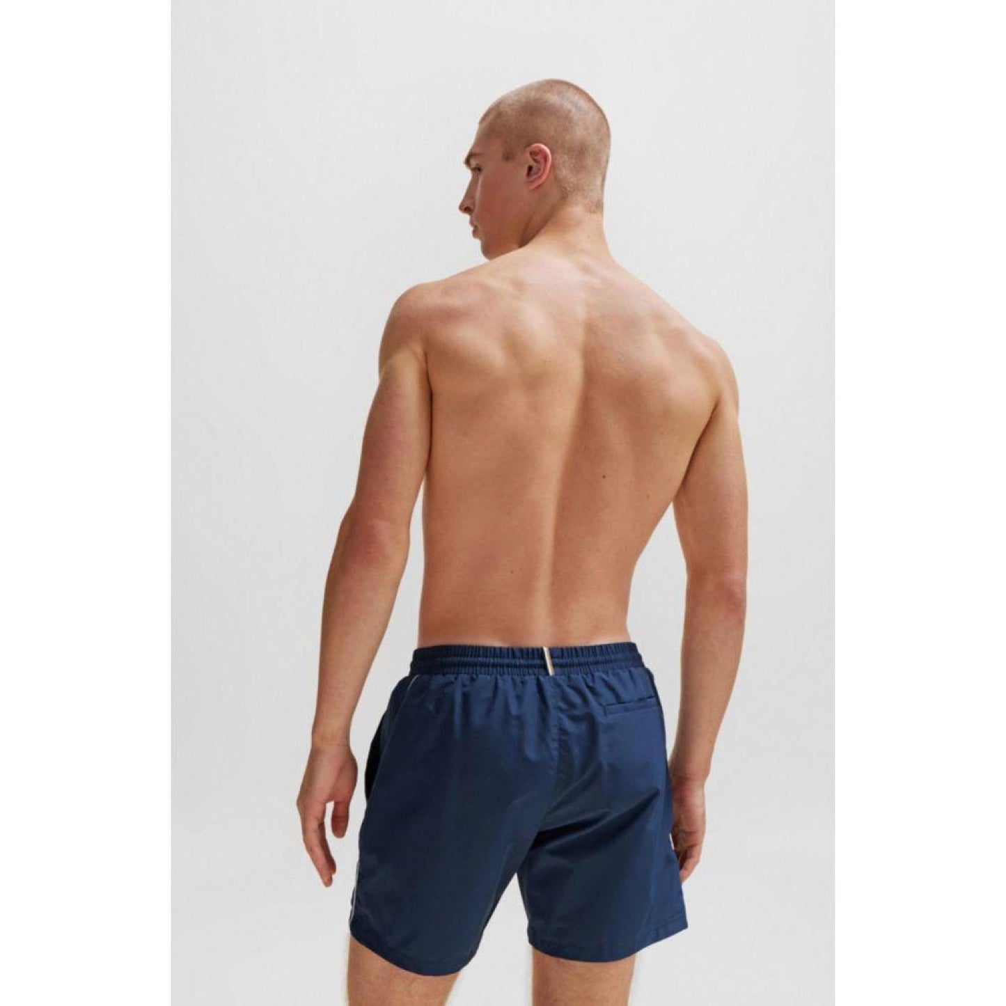 Quick-drying swim shorts with logo and piping