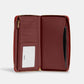 Coach Outlet Dempsey Large Phone Wallet In Signature Jacquard With Stripe And Coach Patch