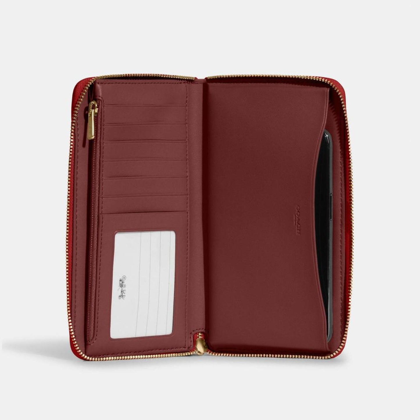 Coach Outlet Dempsey Large Phone Wallet In Signature Jacquard With Stripe And Coach Patch