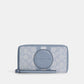 Coach Outlet Dempsey Large Phone Wallet In Signature Jacquard With Stripe And Coach Patch