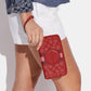 Coach Outlet Dempsey Large Phone Wallet In Signature Jacquard With Stripe And Coach Patch