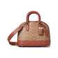 Coated Canvas Signature Revel Bag