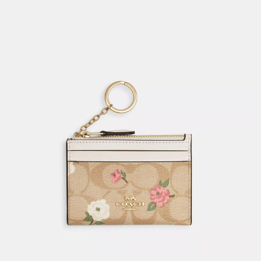 Coach Outlet Mini Skinny Id Case In Signature Canvas With Floral Print