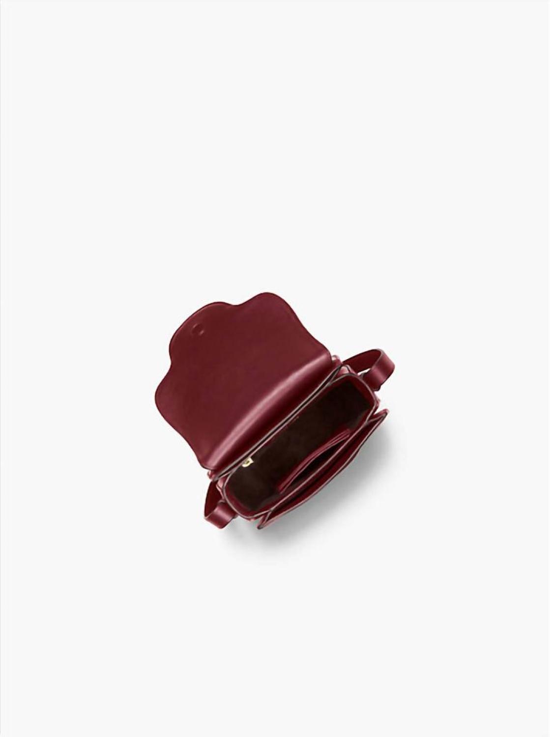 Cary medium grommeted sales leather saddle bag