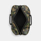 Coach Outlet Trekker 52 In Signature Canvas With Camo Print