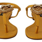 Dolce & Gabbana Mustard T-Strap Flat Sandals with Heart Embellishment